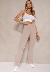 Beżowe Prążkowane Spodnie Typu Dzwony High Waist Farinia. Brązowe spodnie materiałowe damskie Renee, bez wzorów, z jeansu. Za 44.99 zł.