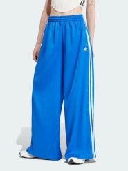 Adidas Spodnie dresowe w kolorze niebieskim rozmiar: 32. Niebieskie spodnie dresowe damskie Adidas, bez wzorów, z dresówki. Za 131.74 zł.