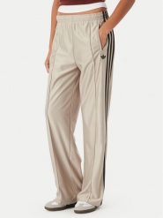 Adidas Spodnie dresowe Metallic Firebird KS9974 Beżowy Wide Leg. Brązowe spodnie dresowe damskie Adidas, xl, bez wzorów, z dresówki. Za 369.99 zł.