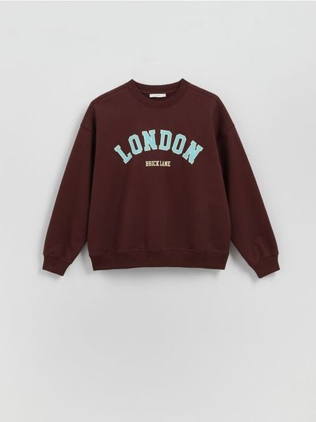 Bluza z haftowanym napisem - ciemnobrązowy. Brązowe bluzy damskie Reserved, l, bez wzorów, z bawełny, bez kaptura. W wyprzedaży za 59.99 zł.