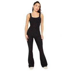 Spodnie kombinowane damskie w szerszym kroju Fabletics HeatherFlex. Czarne kombinezony damskie FABLETICS, xl, bez wzorów, z materiału, bez kołnierzyka, bez ramiączek. Za 468.00 zł.