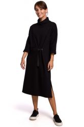 Ciepła sukienka oversize z golfem czarna bawełniana dzianina. Czarne sukienki damskie Sukienki.shop, bez wzorów, z bawełny, bez ramiączek. Za 319.00 zł.