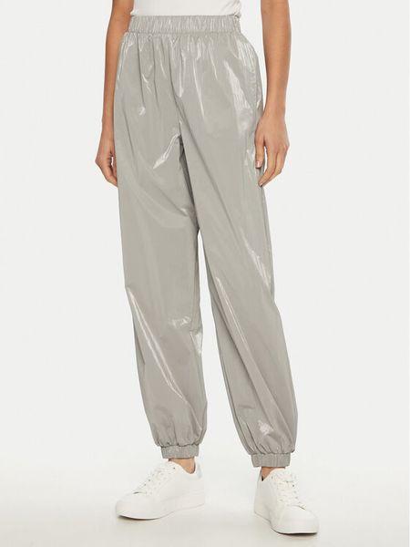 Guess Spodnie dresowe V5RB09 WGUJ0 Szary Regular Fit. Szare spodnie dresowe damskie Guess, xs, z aplikacjami, z dresówki. Za 269.99 zł.