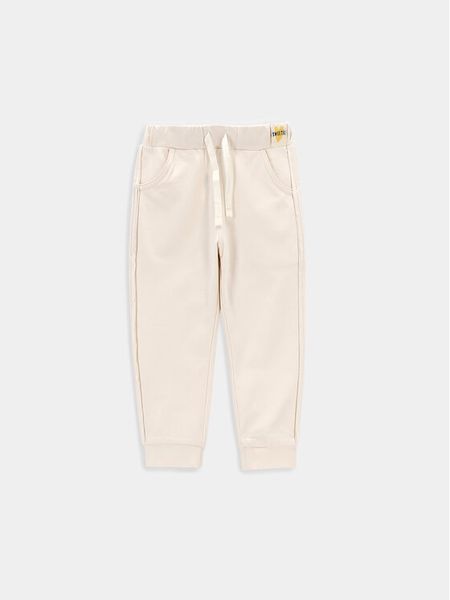 Coccodrillo Spodnie dresowe WC4120101CEN Écru Regular Fit. Spodnie dresowe dziewczęce COCCODRILLO, bez wzorów, z bawełny. Za 39.99 zł.