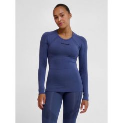 Damska koszulka bezszwowa z długim rękawem Hummel Shaping. Niebieskie koszulki damskie Hummel, bez wzorów, bez kołnierzyka, bez ramiączek. Za 135.00 zł.