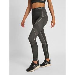 Damskie legginsy mid-rise Hummel MT Mila. Brązowe legginsy damskie Hummel, xs, bez wzorów, z dzianiny. Za 201.30 zł.