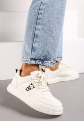 Beżowe Sneakersy z Ozdobnym Nadrukiem i Delikatną Perforacją Bleordia. Brązowe obuwie sportowe damskie Born2be, z jeansu, bez zapięcia. Za 89.99 zł.