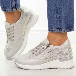 Srebrne skórzane sneakersy damskie S.Barski 7081. Szare obuwie sportowe damskie S.BARSKI, na jesień, z dresówki, bez zapięcia, trekkingowe. Za 279.00 zł.