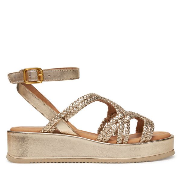 Sandały Unisa. Żółte sandały damskie Unisa, bez wzorów, bez obcasa, na koturnie, bez zapięcia. Za 529.99 zł.