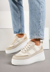 Beżowe Sneakersy na Grubej Podeszwie z Tłoczeniami Zdobione Przeszyciami Falinia. Brązowe obuwie sportowe damskie Born2be, z jeansu, bez zapięcia. Za 109.99 zł.