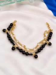 L'Atelier de Gaia Pozłacana bransoletka z onyksami na kostkę rozmiar: onesize. Czarne bransoletki damskie L'Atelier de Gaia, pozłacane. Za 46.95 zł.