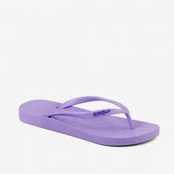 Damskie klapki Coqui. Fioletowe klapki damskie Coqui, bez wzorów, z materiału, bez obcasa, bez zapięcia. Za 130.99 zł.