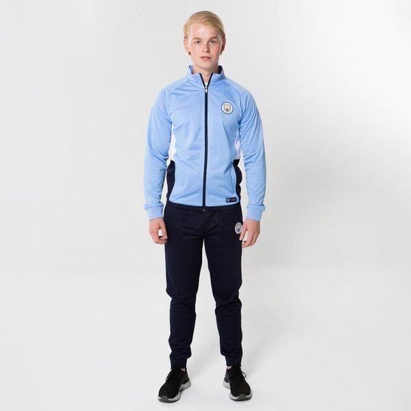 Dres piłkarski dla dorosłych Manchester City. Niebieskie kombinezony damskie MANCHESTER CITY, s, bez wzorów, z dresówki, sportowe, bez kołnierzyka, bez ramiączek. Za 388.60 zł.