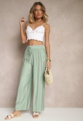 Miętowe Spodnie Typu Palazzo o Szerokim Kroju High Waist Ozdobione Wiązaniem Yaslevia. Zielone spodnie materiałowe damskie Renee, bez wzorów, z jeansu. Za 39.99 zł.
