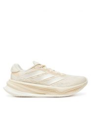 Adidas Buty do biegania Supernova Comfortglide IH0905 Beżowy. Brązowe obuwie sportowe damskie Adidas, z materiału, bez zapięcia, do biegania. Za 409.99 zł.