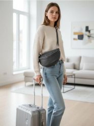 Saszetka nerka na regulowanym pasku z imitacji skóry - czarny. Czarne nerki i saszetki damskie Sinsay, bez wzorów, ze skóry. Za 29.99 zł.