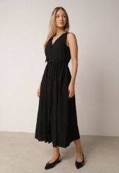 Czarna Sukienka o Rozkloszowanym Kroju z Wiskozą i Bawełną z Paskiem Kelaliria. Czarne sukienki damskie Born2be, bez wzorów, z bawełny, eleganckie, bez ramiączek. Za 159.99 zł.