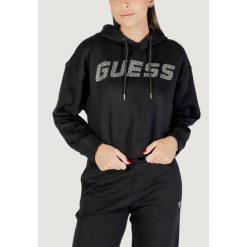 Bluza Kobieta GUESS ACTIVE PRIMULA RHINESTONES HOODIE SWE. Czarne bluzy damskie Guess Active, z aplikacjami, z bawełny, bez kaptura. W wyprzedaży za 314.90 zł.