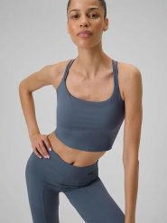 4F Top w kolorze niebieskim do jogi rozmiar: S. Niebieskie koszulki sportowe damskie 4F, s, bez wzorów, z materiału, bez ramiączek, na jogę i pilates. Za 92.64 zł.