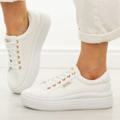 Białe trampki damskie Lee Cooper 4474. Białe trampki damskie Lee Cooper, bez wzorów, z gumy, bez zapięcia. Za 139.00 zł.