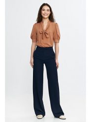 Nife Spodnie w kolorze granatowym rozmiar: 36. Niebieskie spodnie materiałowe damskie Nife, bez wzorów, z materiału. Za 156.24 zł.