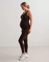 Damskie legginsy ciążowe, z wysokim stanem, squat proof Sense czekoladowe. Brązowe legginsy damskie Aim'n, xl, bez wzorów, z elastanu. Za 301.00 zł.