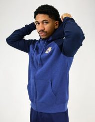 Granatowa bluza z kapturem Real Madryt. Niebieskie bluzy damskie REAL MADRID, s, bez wzorów, z bawełny, z kapturem. Za 295.69 zł.