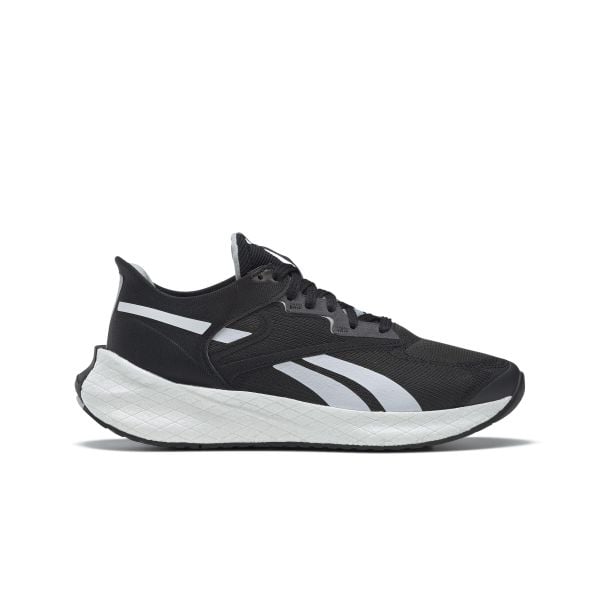 Buty do chodzenia damskie Reebok Floatride Energy Symmetro. Czarne obuwie sportowe damskie Reebok, z gumy, bez zapięcia, do biegania. Za 261.00 zł.