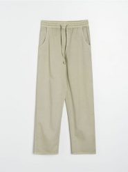 Jeansy jogger balloon z efektem sprania z lyocellem - zielony. Zielone jeansy damskie Sinsay. Za 59.99 zł.