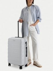 GINO ROSSI Walizka średnia CEO-GIN-M-003-05-SILVER2 Srebrny. Szare walizki Gino Rossi, bez wzorów, z tworzywa sztucznego, średnie. Za 279.99 zł.