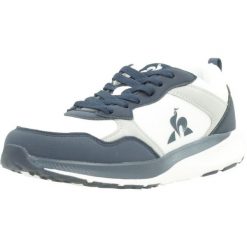 Kapcie LE COQ SPORTIF 2422716L Niebieski. Niebieskie kapcie damskie le coq sportif, z tkaniny. Za 210.25 zł.