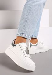 Biało-Srebrne Sneakersy na Grubej Podeszwie z Metaliczną Aplikacją i Cyrkoniami Loraria. Białe obuwie sportowe damskie Born2be, z materiału, bez zapięcia. Za 84.99 zł.