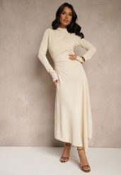 Beżowa Asymetryczna Sukienka Koktajlowa z Ozdobnymi Guzikami Dralriti. Brązowe sukienki damskie Renee, bez wzorów, eleganckie, bez ramiączek. W wyprzedaży za 127.99 zł.