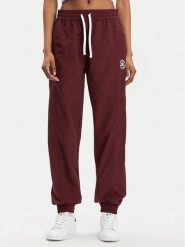 Converse Spodnie dresowe Star Printer 10026055-A02 Bordowy Tapered Fit. Czerwone spodnie dresowe damskie Converse, l, bez wzorów, z dresówki. Za 239.99 zł.