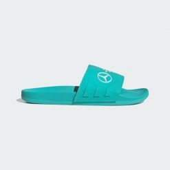 Klapki Mercedes - AMG Petronas Formula One Team adilette Comfort. Białe klapki damskie Adidas, bez wzorów, bez obcasa, bez zapięcia. Za 239.00 zł.