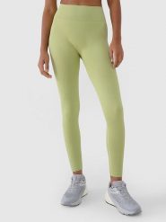 4F Legginsy funkcyjne w kolorze limonkowym rozmiar: M/L. Zielone legginsy damskie 4F, l, bez wzorów, z materiału. Za 68.95 zł.