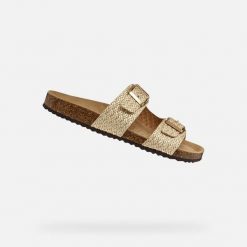 Sandały GEOX D BRIONIA Beżowy. Żółte sandały damskie Geox, bez wzorów, ze skóry, bez obcasa, bez zapięcia. Za 315.99 zł.