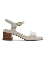 Clarks Skórzane sandały "Jaylan Ray" w kolorze jasnoszarym na obcasie rozmiar: 36. Szare sandały damskie Clarks, bez wzorów, z otwartym noskiem, bez obcasa, na koturnie, bez zapięcia. Za 157.73 zł.