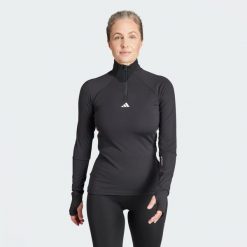 Koszulka Techfit COLD.RDY 1/4 Zip Long Sleeve Training. Czarne koszulki damskie Adidas, m, bez wzorów, z materiału, bez kołnierzyka, bez ramiączek. W wyprzedaży za 194.35 zł.