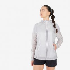 Kurtka turystyczna damska Quechua MH900 Light. Białe kurtki sportowe damskie QUECHUA, l, bez wzorów, z materiału, bez kaptura. W wyprzedaży za 89.99 zł.