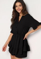 Czarny Taliowany Kombinezon z Gumką w Talii i Ozdobną Falbanką przy Rękawach Nanselena. Czarne sukienki damskie Born2be, bez wzorów, eleganckie, bez ramiączek. Za 99.99 zł.