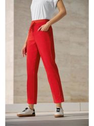 Heine Spodnie dresowe w kolorze czerwonym rozmiar: 40. Czerwone spodnie dresowe damskie Heine, bez wzorów, z dresówki. Za 86.99 zł.