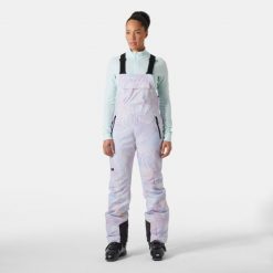 Damski kombinezon narciarski Helly Hansen Legendary Bib. Fioletowe kombinezony damskie Helly Hansen, na zimę, bez wzorów, sportowe, bez kołnierzyka, bez ramiączek. W wyprzedaży za 923.00 zł.