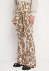 Beżowy Spodnie Typu Dzwony z Wysokim Stanem z Gumką w Pasie Zaimi. Brązowe spodnie materiałowe damskie Born2be, bez wzorów, z jeansu. Za 39.99 zł.