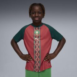 Młodzieżowa koszulka na rozgrzewkę Maroka PUMA. Czerwona bluzki damskie Puma, m, bez wzorów, młodzieżowe, bez kołnierzyka, bez ramiączek. Za 327.50 zł.