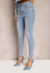 Jasnoniebieskie Jeansy o Dopasowanym Fasonie z Ozdobną Szlufką z Przodu Valmarie. Niebieskie jeansy damskie Renee, bez wzorów, z jeansu. Za 89.99 zł.
