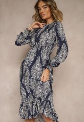 Niebieska Rozkloszowana Sukienka w Etniczny Print z Gumką w Talii i Falbanką Napirea. Niebieskie sukienki damskie Renee, bez wzorów, eleganckie, bez ramiączek. W wyprzedaży za 83.99 zł.