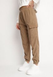 Brązowe Spodnie w Stylu Cargo z Wysokim Stanem Belseli. Brązowe spodnie materiałowe damskie Born2be, bez wzorów, z jeansu. Za 39.99 zł.