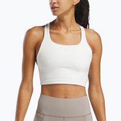Koszulka Reebok Lux Tank. Białe koszulki damskie REEBOK FITNESS, bez wzorów, bez kołnierzyka, bez ramiączek. Za 209.99 zł.