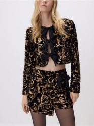 Cekinowa marynarka z kokardami - czarny. Czarne marynarki i żakiety damskie Reserved, l, bez wzorów, z dzianiny. Za 179.99 zł.